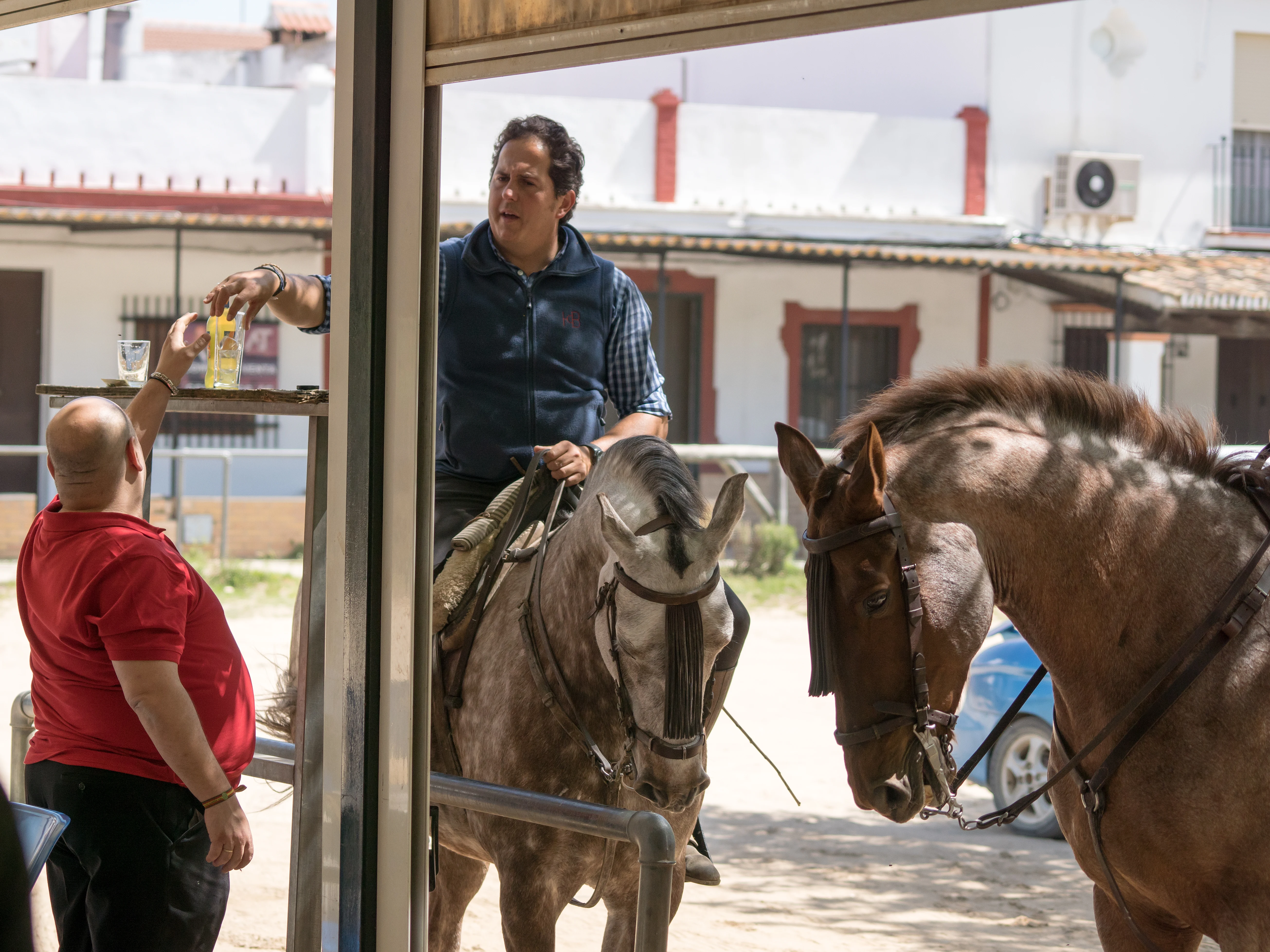Visiting the bar, El Rocio, Coto Donana, Andalucia, Spain — photo by Jim Bennett