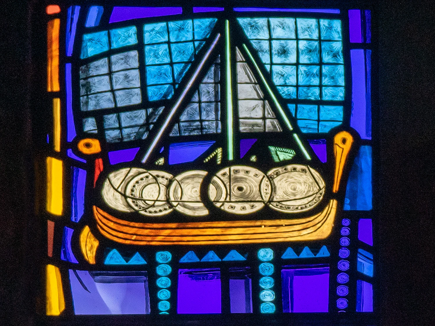 Stained glass window, St Magnus Cathedral, Orkney, UK — photo by Jim Bennett