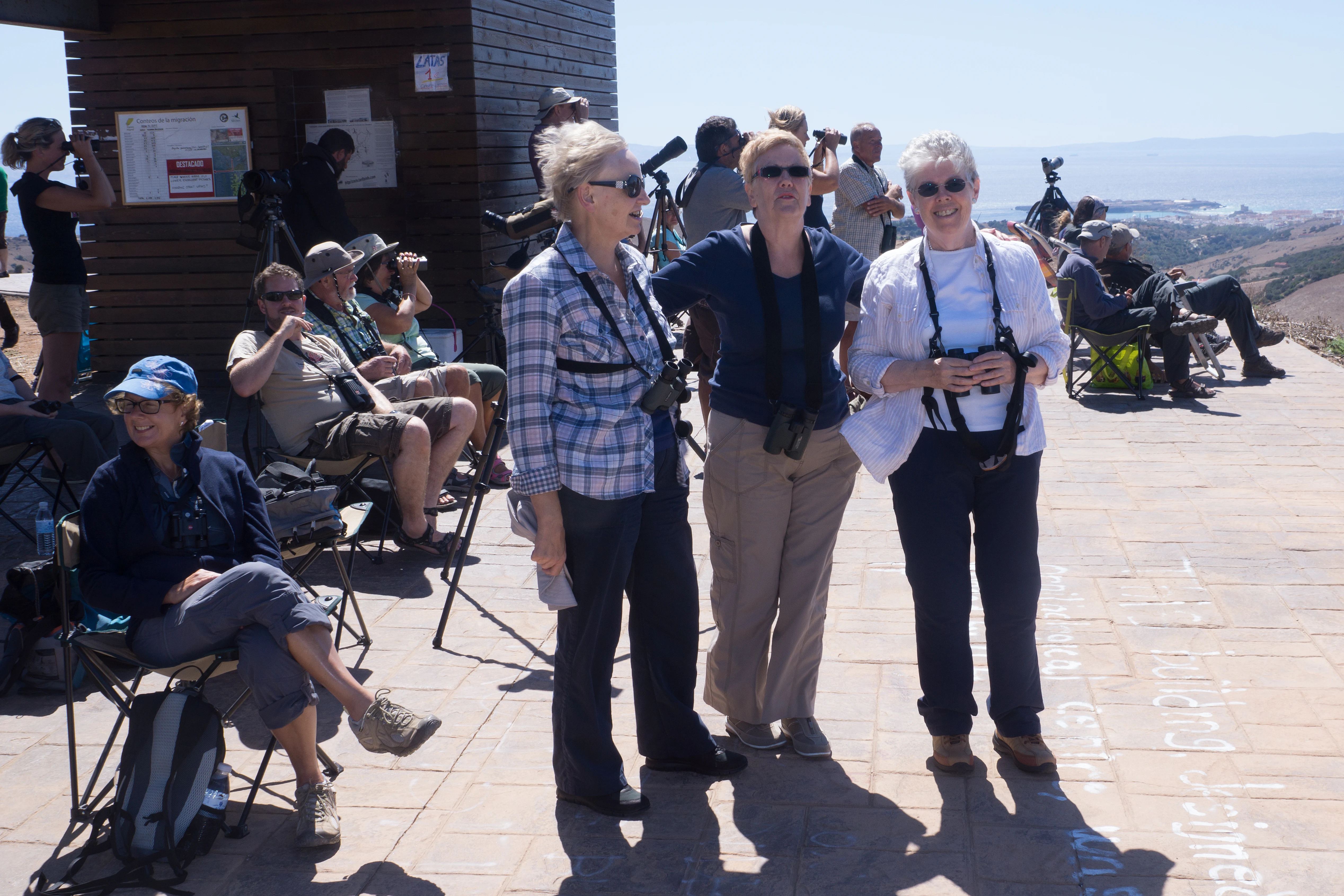 Julie, Dave, Peter & Jill seated, Barbara, Gail & Jenny standing, Cazalla watchpoint, Spain — photo by Jim Bennett