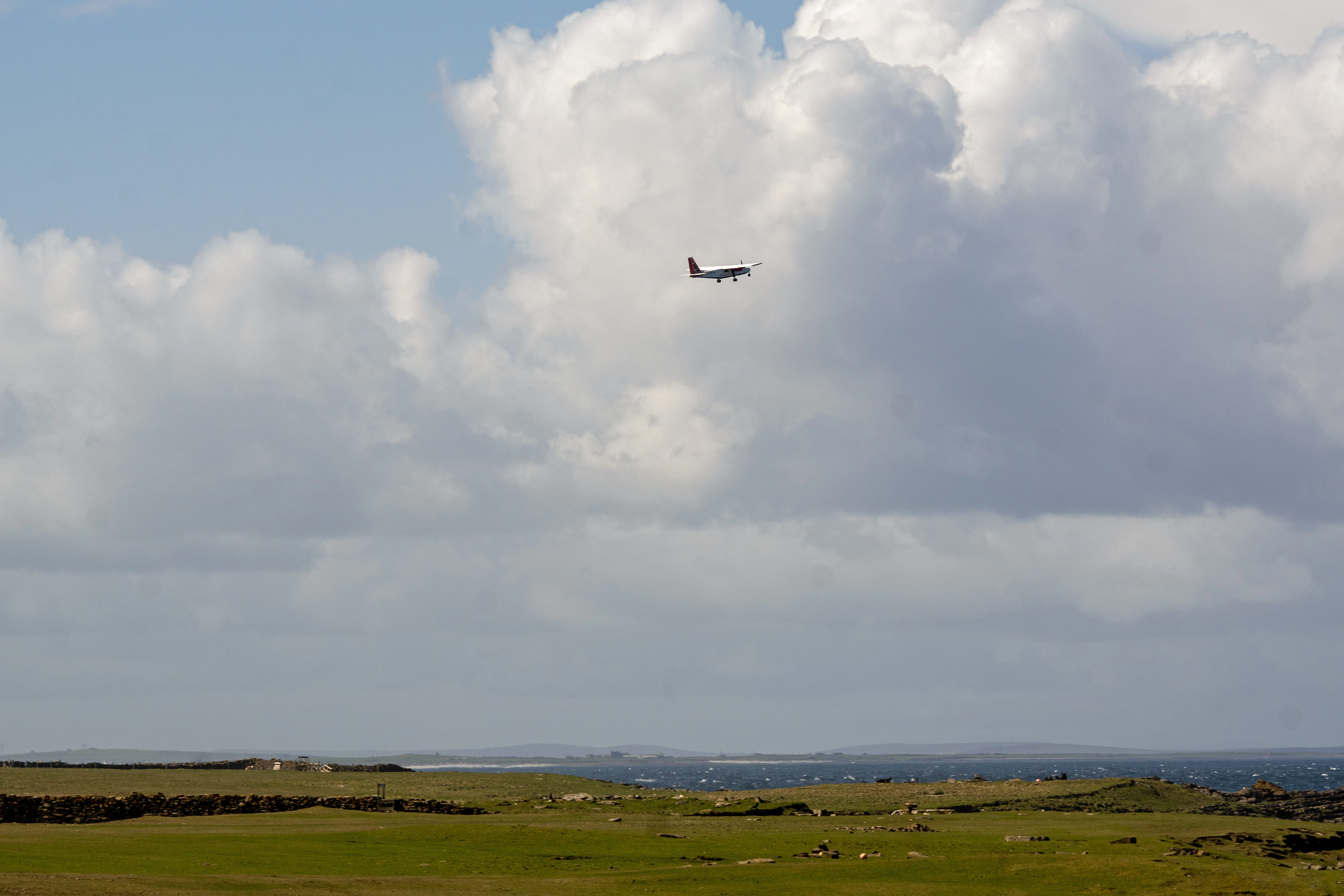 Plane leaving, North Ronaldsay, UK — photo by Jim Bennett