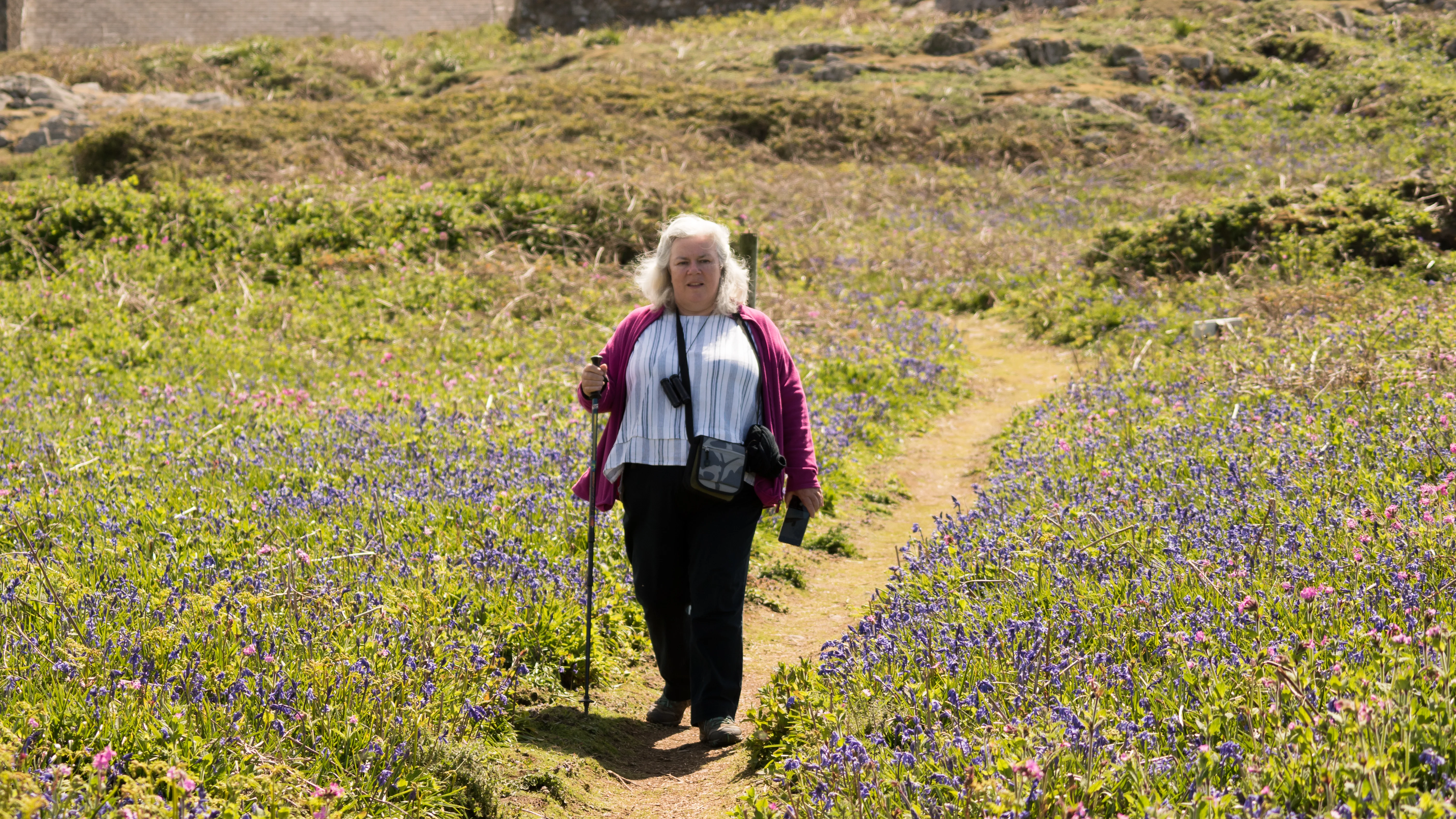 Caroline & Bluebells, Skomer, Pembrokeshire, UK — photo by Jim Bennett