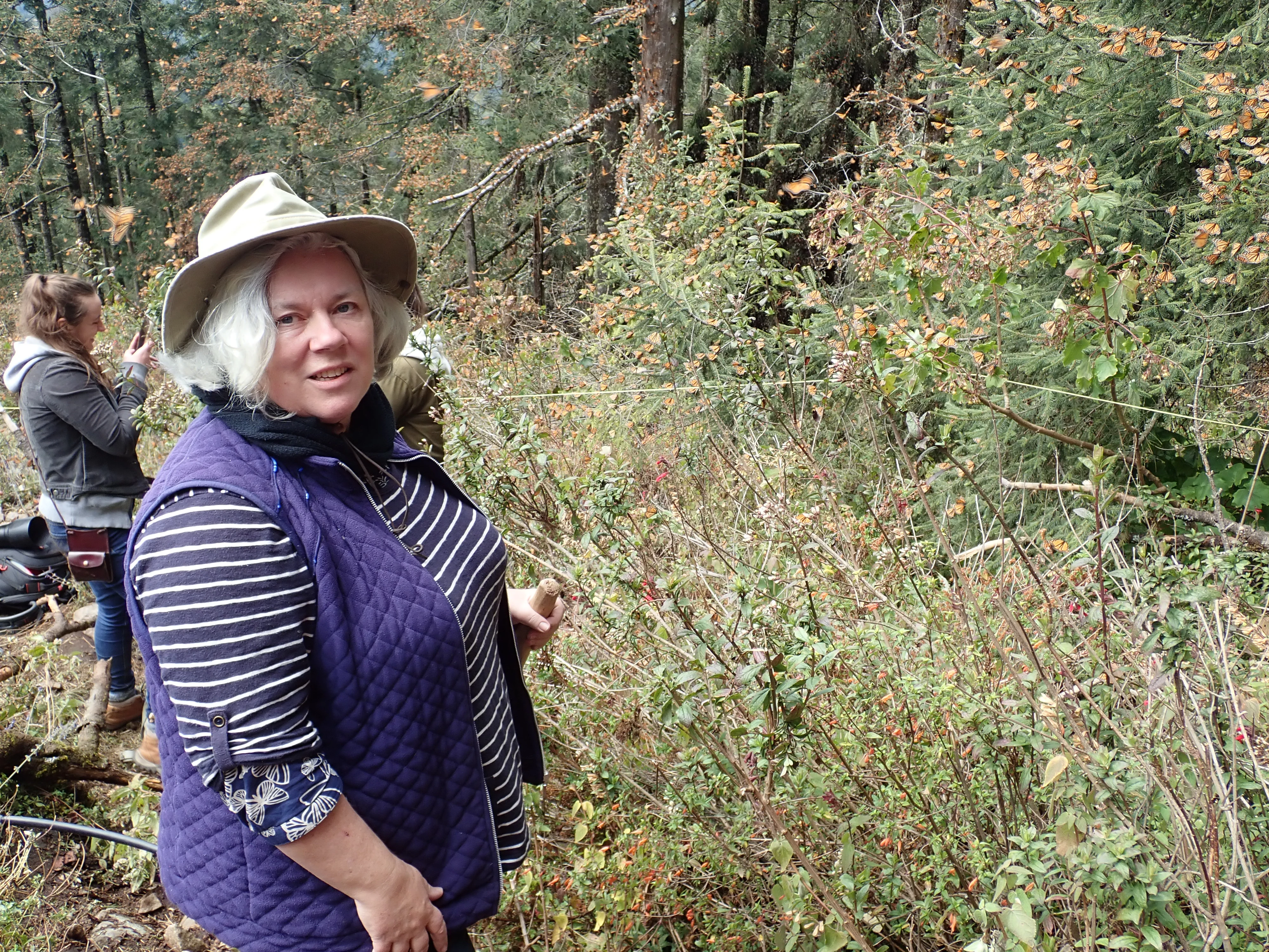 Caroline & Monarch Butterflies, Sierra Chincua Monarch Reserve, Michoacan, Mexico — photo by Jim Bennett