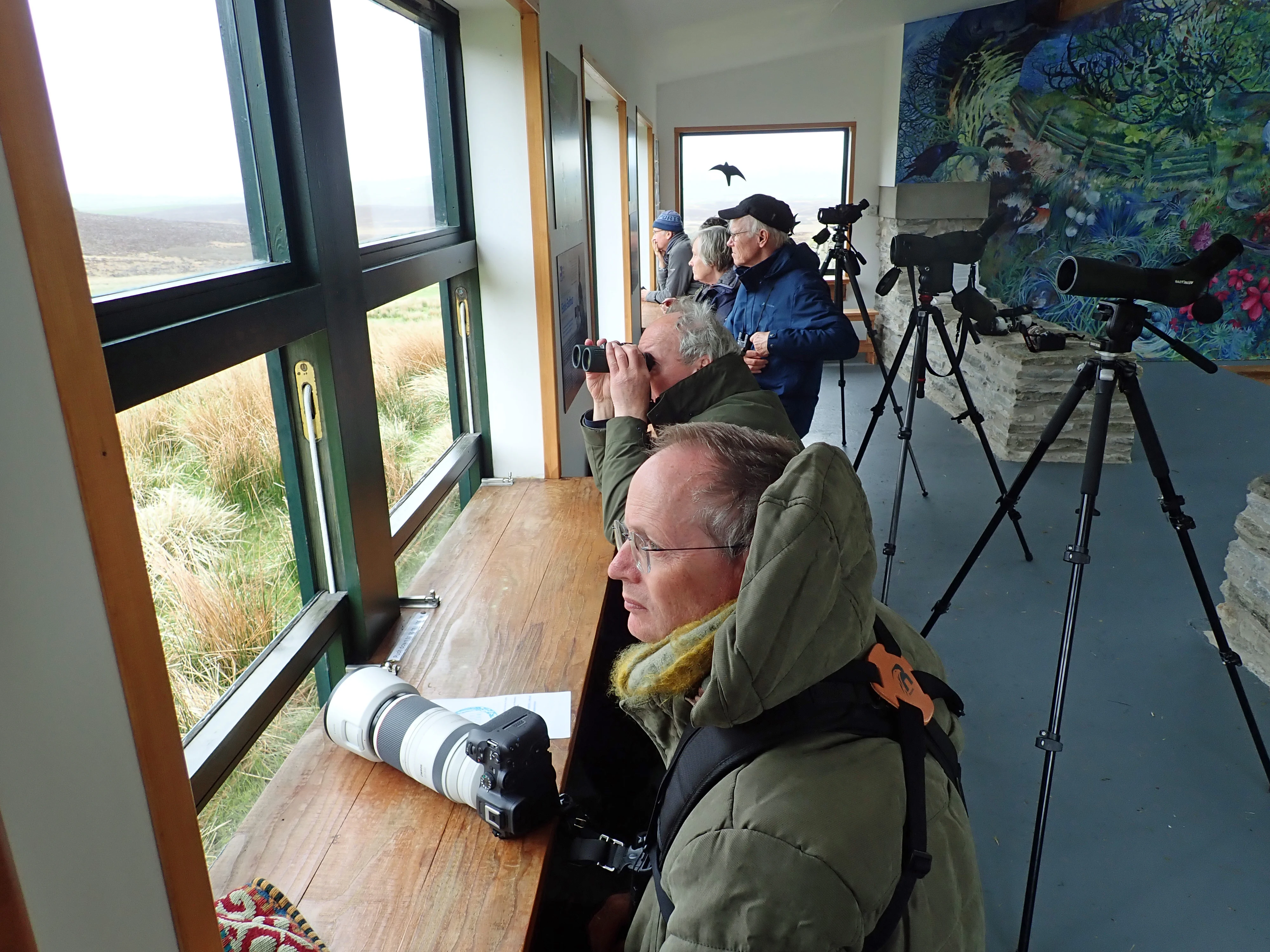 Adam in the RSPB Harrier Hide, Orkney, UK — photo by Jim Bennett
