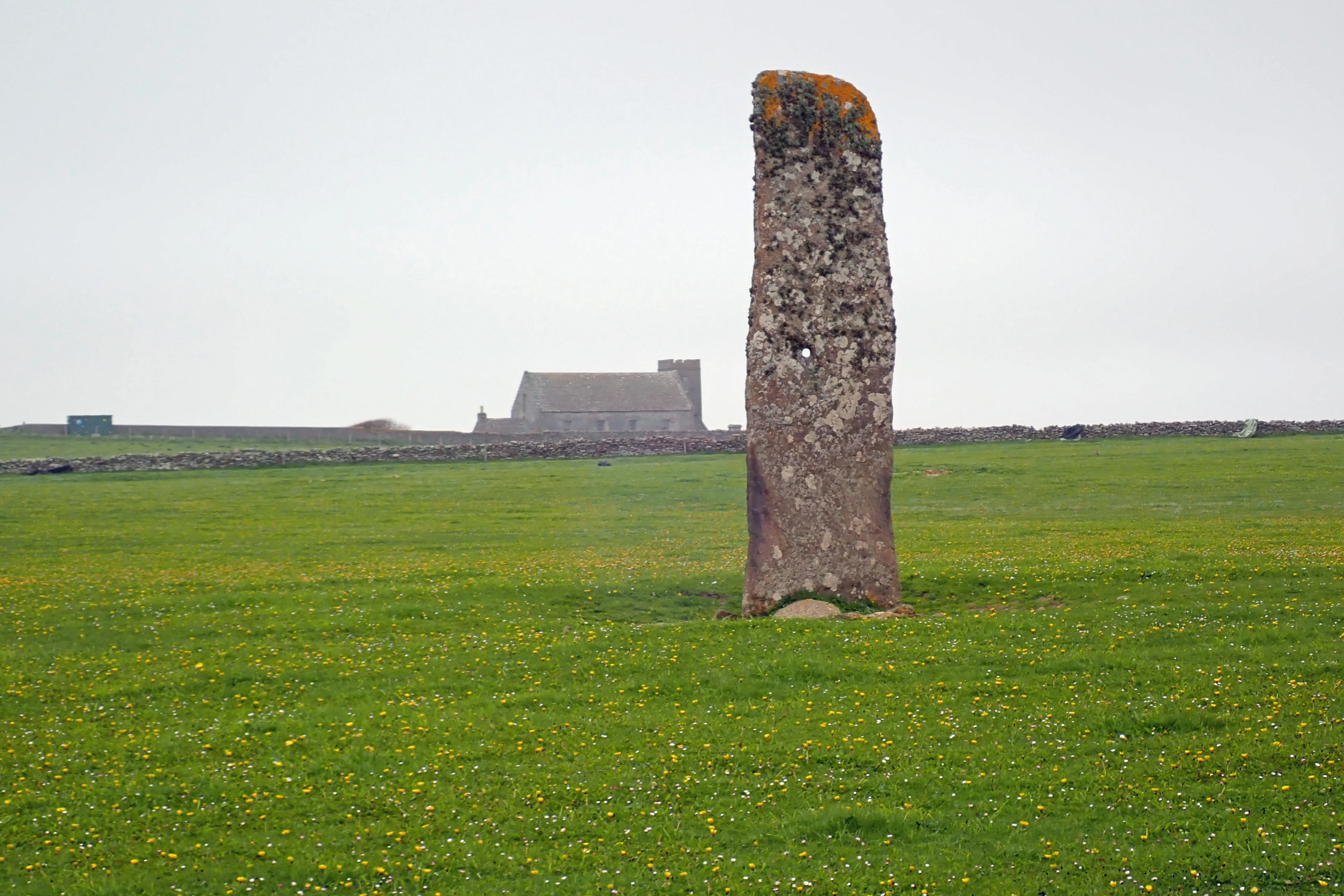 Standing Stone & Old Kirk, North Ronaldsay, UK — photo by Jim Bennett