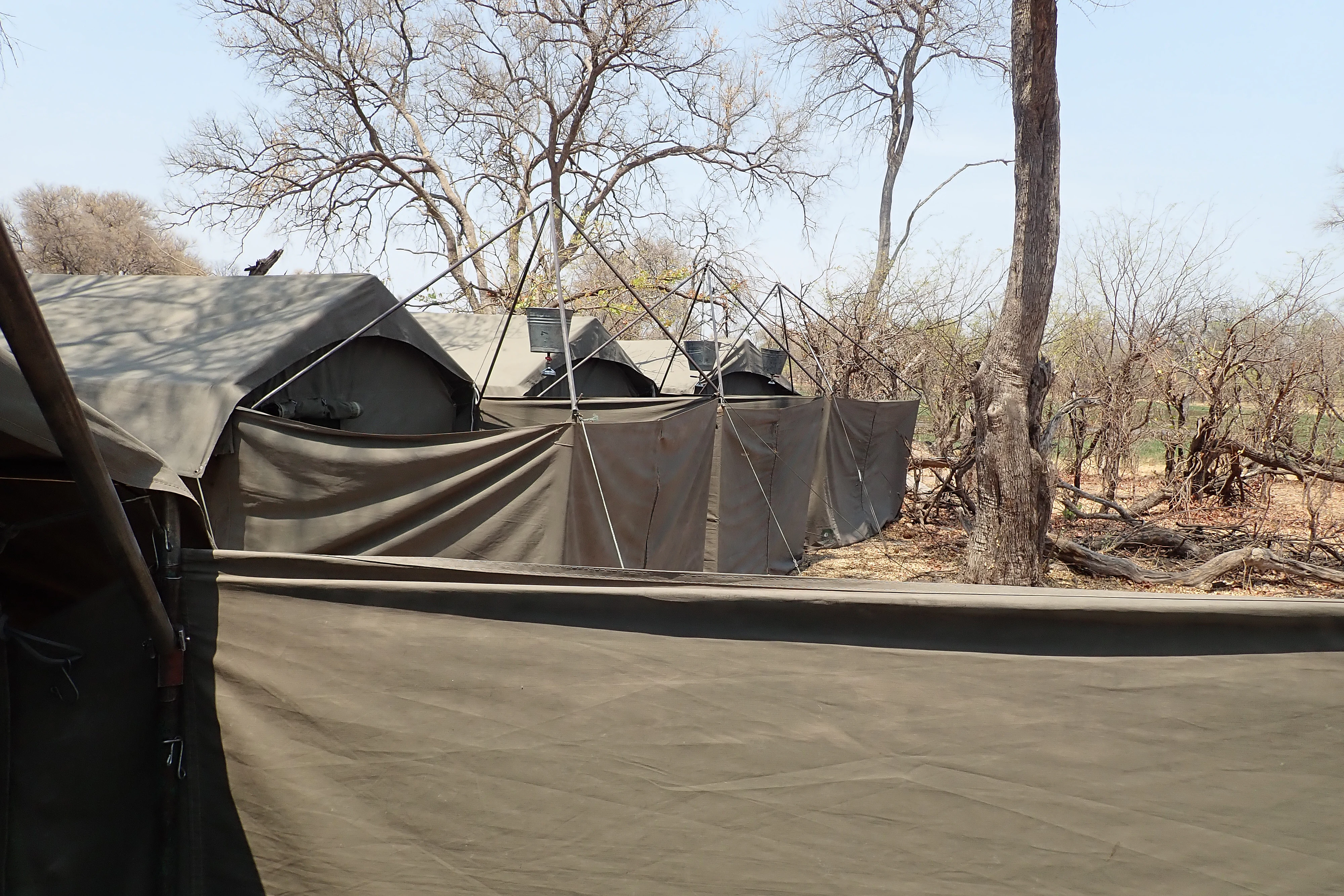 Bucket showers, Khwai campsite, Botswana — photo by Jim Bennett