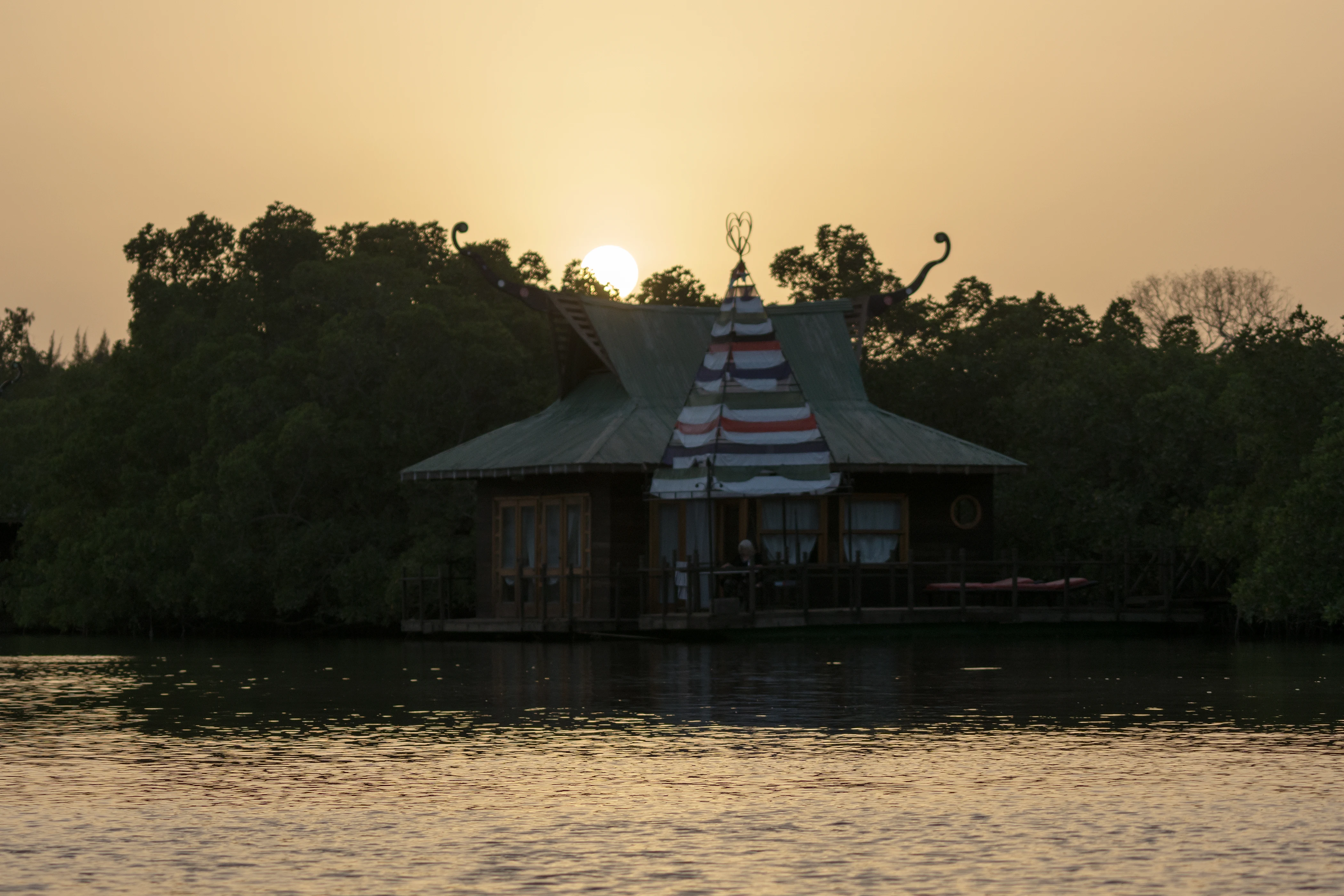 Caroline at our lodge at sunset, The Gambia — photo by Jim Bennett