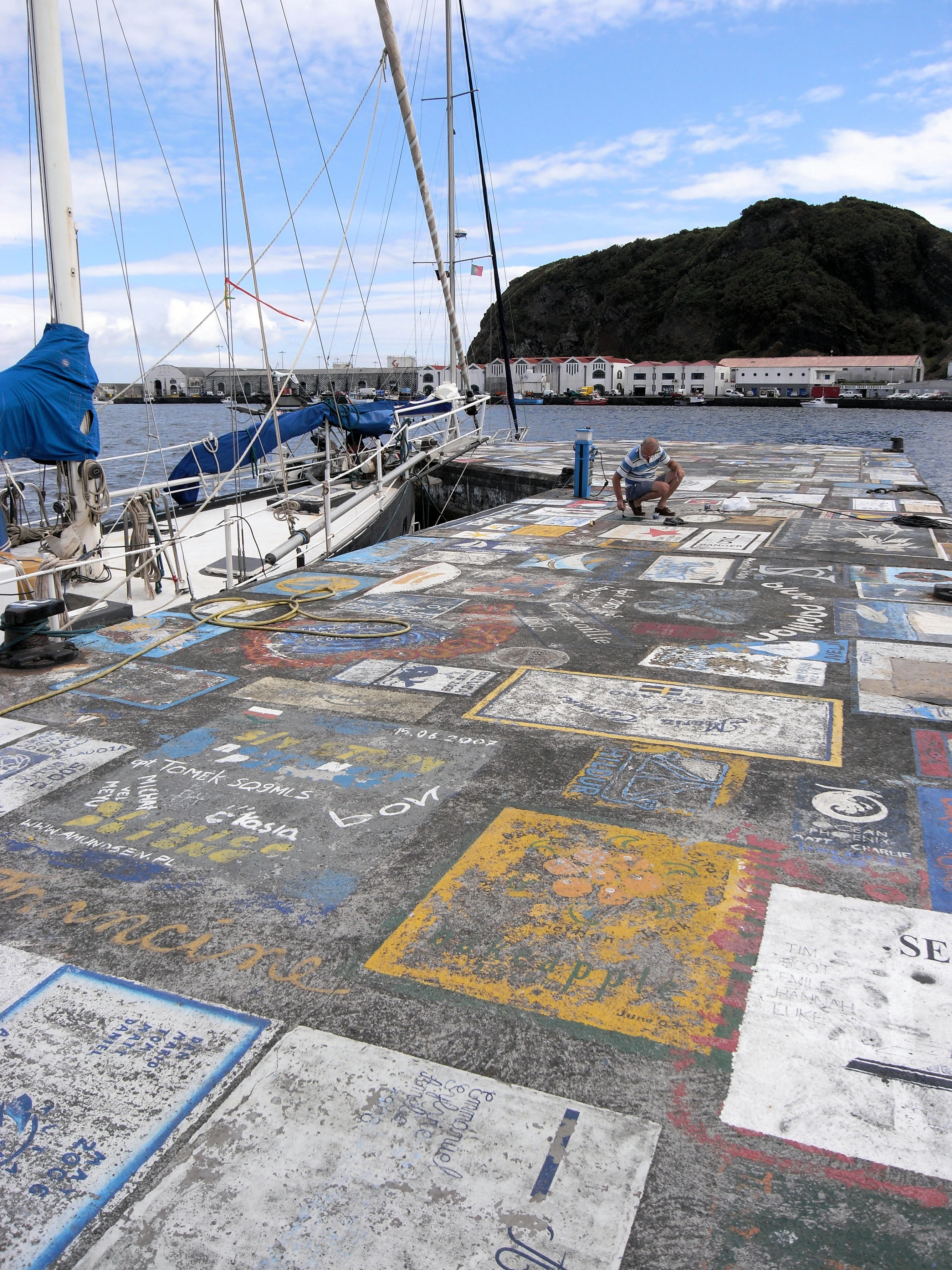 A sailor leaves his mark, Horta Harbour, Azores, Portugal — photo by Jim Bennett