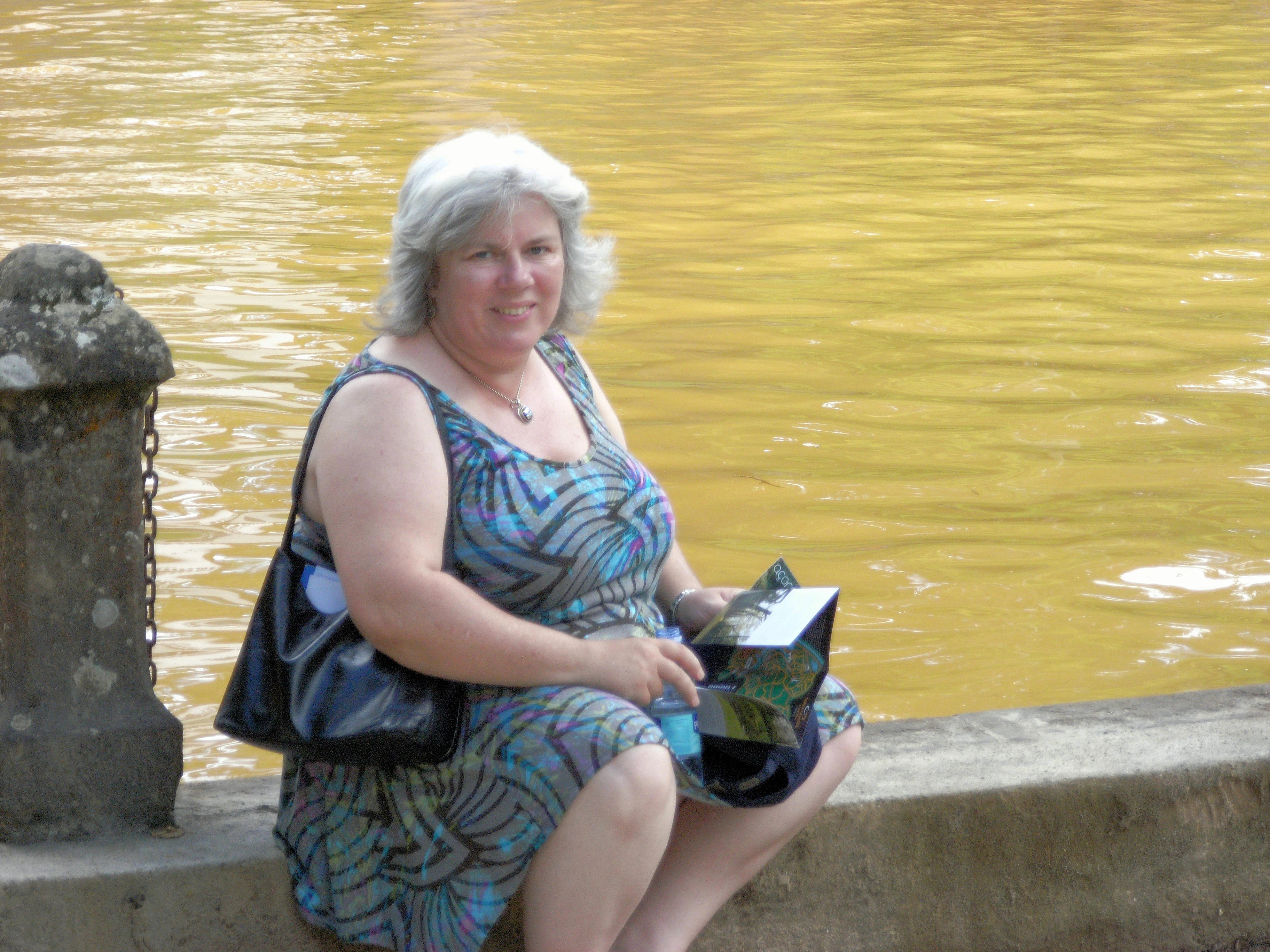 Caroline by the hot pool, Terra Nostra gardens, Furnas, Azores, Portugal — photo by Jim Bennett