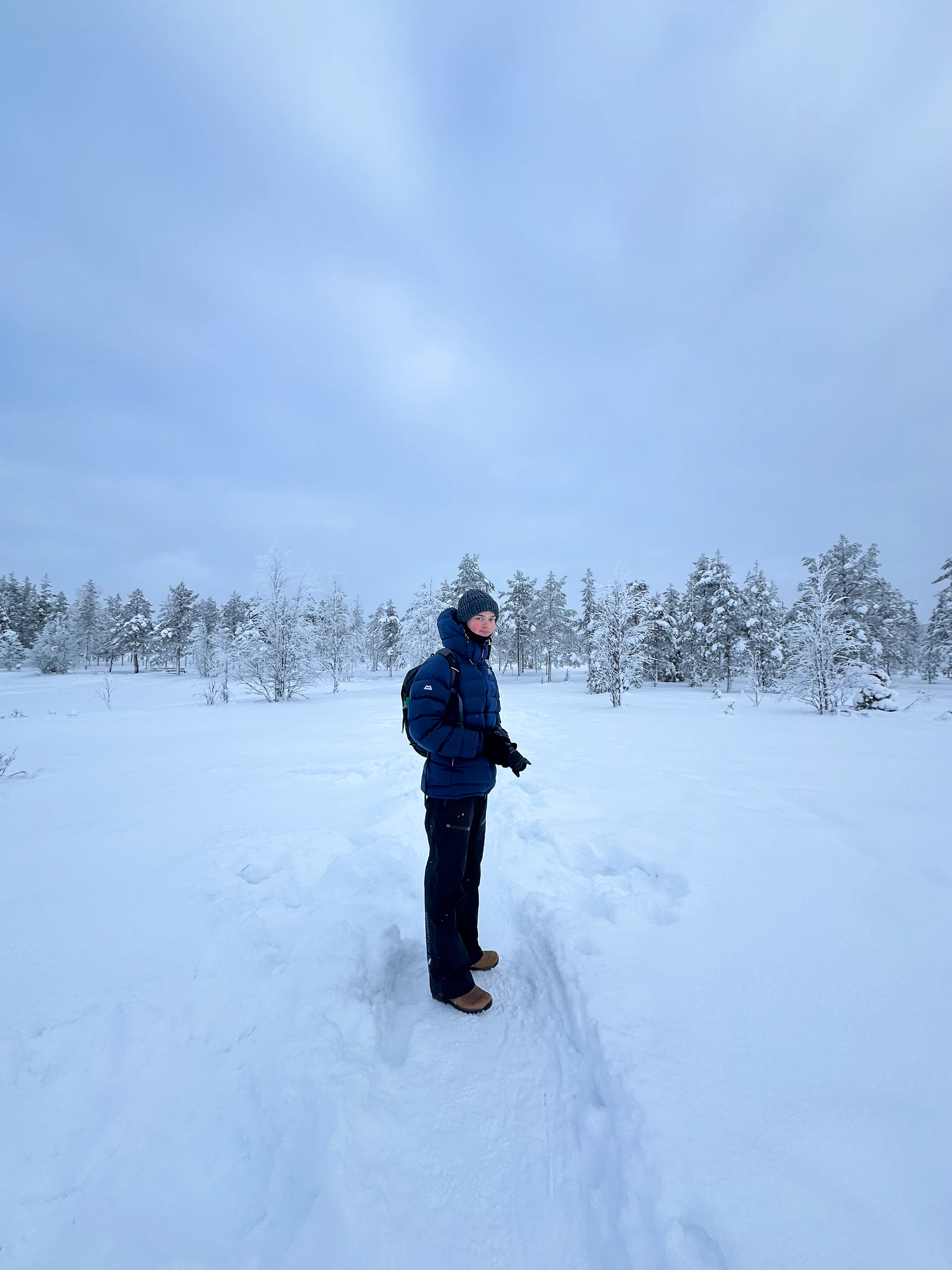 Person standing in snowy landscape, Ÿllas, Finland — photo by Orlando Prugel-Bennett