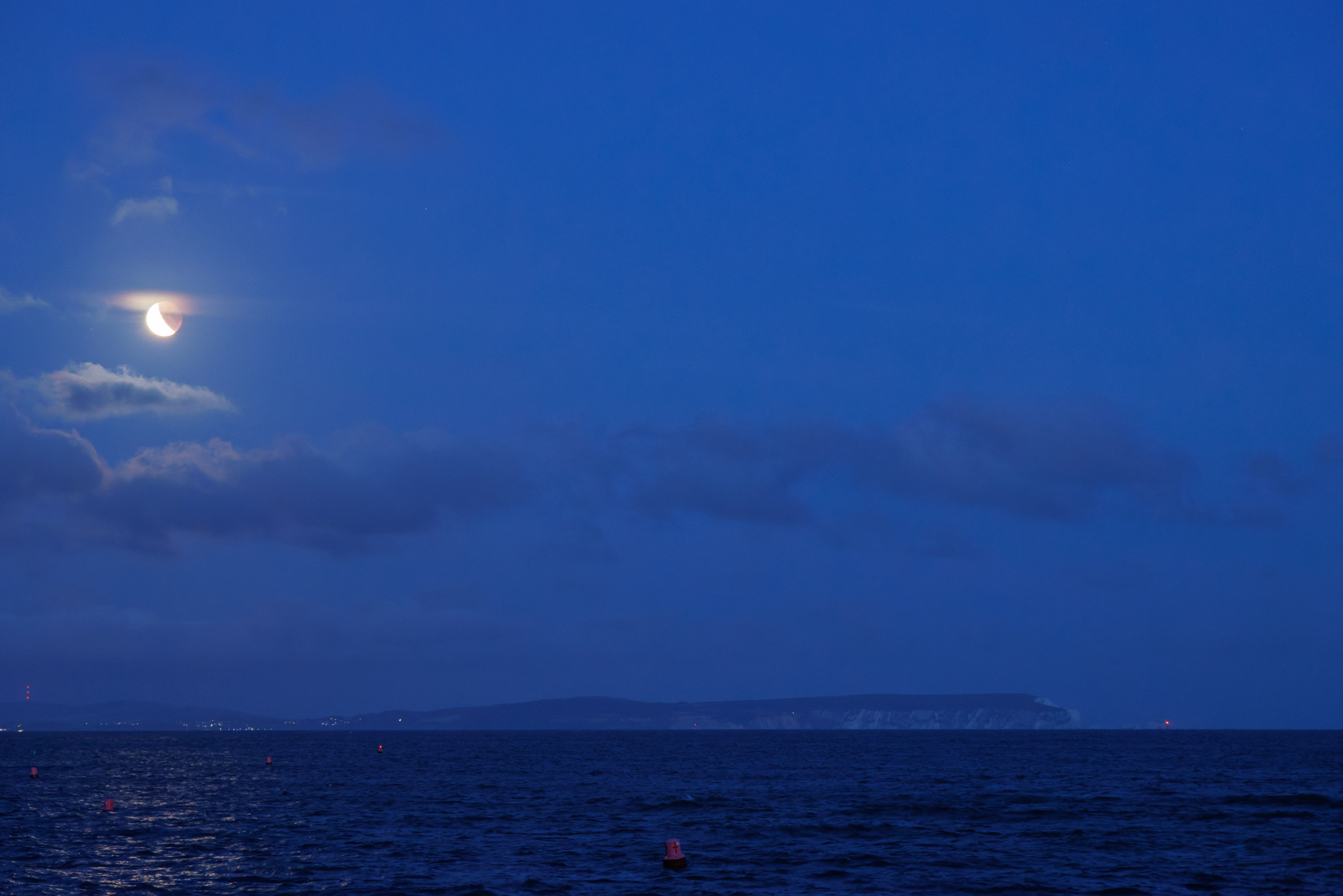 Lunar Eclipse, Sandbanks, Dorset, UK — photo by Orlando Prugel-Bennett